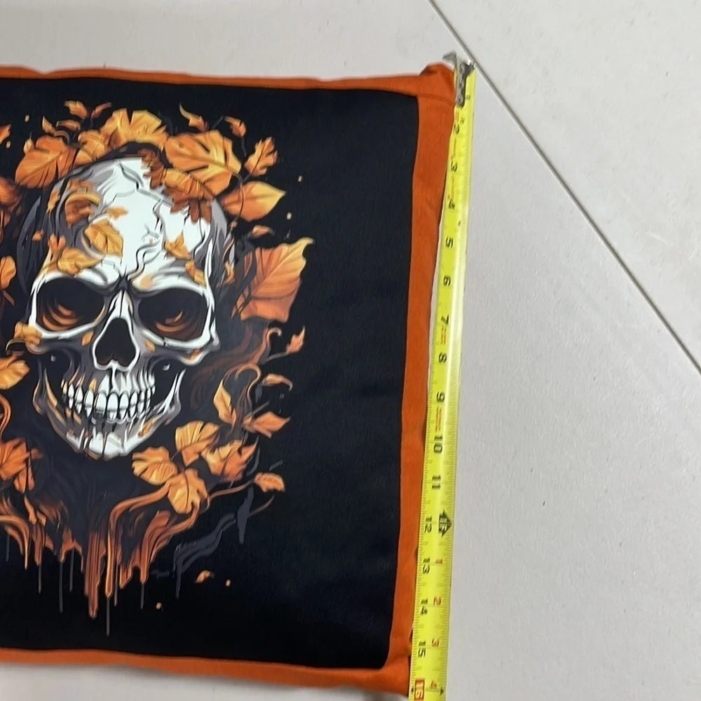 Homemade brand new accent T-shirt pillow. Black and orange autumn skull.
